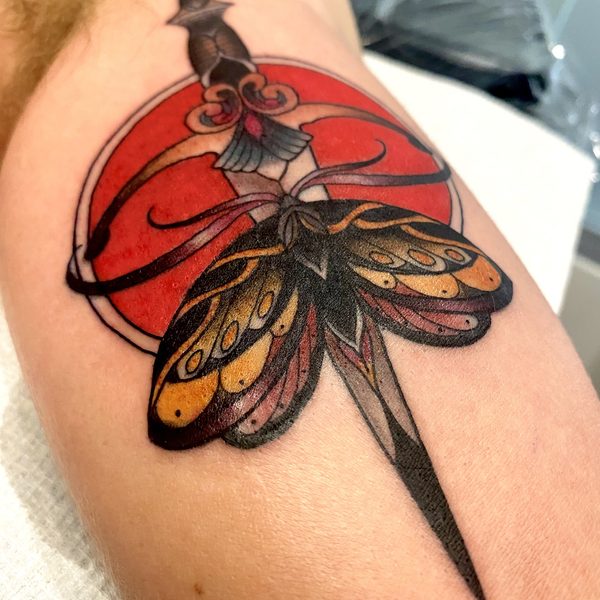 Neo-traditional dragonfly tattoo, custom work by Jase Docia