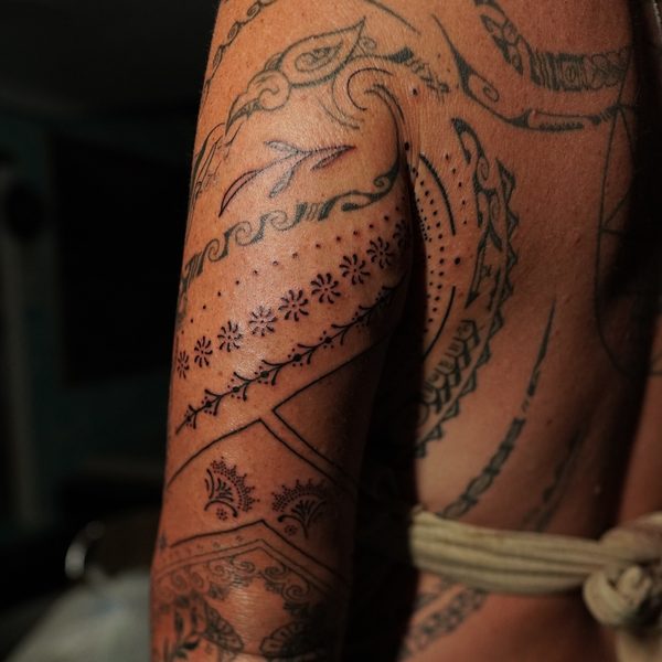 Ornamental sleeve tattoo with dotwork detail, Valdora private studio